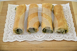 Iconic rustic Romanian and Moldavian pies with greens and spinach filing