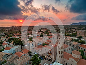 Iconic scenery over the old historical town of Areopoli Lakonia  Greece against a dramatic sunset sky
