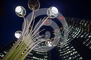Iconic skyscraper `Unicredit Tower` by night in the modern area of Milan near Garibaldi railway station, Italy photo