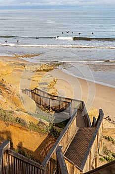 The iconic southport stairs with surfers in the distance at Port Noarlunga South Australia on September 22nd 2022