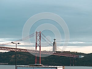 Iconic Symmetry - 25 de Abril Bridge with Christ the King Statue