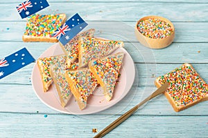 Iconic traditional Australian party food, Fairy Bread, on a red, white and blue background