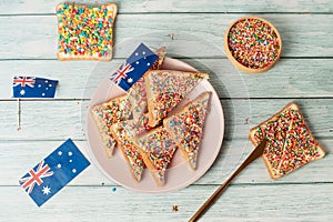 Iconic traditional Australian party food, Fairy Bread, on a red, white and blue background