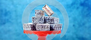 Iconic traditional Australian party food, Lamington, background banner.
