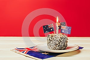 Iconic traditional Australian party food, Lamington cakes on a red, white and blue background