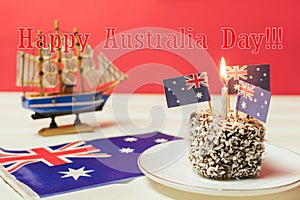 Iconic traditional Australian party food, Lamington cakes on a red, white and blue background.