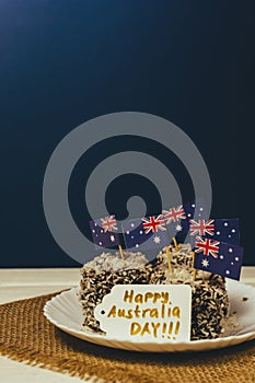 Iconic traditional Australian party food, Lamington cakes on a red, white and blue background