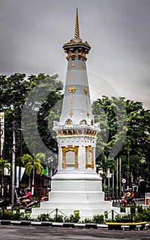 An iconic tugu muda photo taken in yogyakarta indonesia with trees