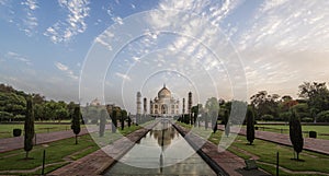 Iconic view of Taj Mahal one of the World Wonders at sunrise, Agra, India