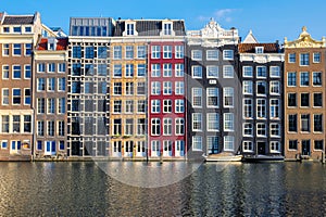 Iconic view of traditional old buildings in Amsterdam, the Netherlands