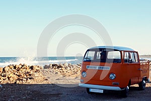 Iconic vintage mini van near the sea
