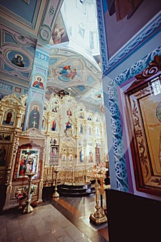 The iconostasis in the Orthodox Church decorated with gold