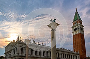 Icons of Venice, Italy: St Mark lion and St Theodore columns in piazzetta on St Mark square. Campanile of St Mark and