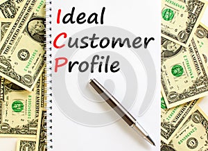 ICP ideal customer profile symbol. Concept words ICP ideal customer profile on beautiful white note. Beautiful dollar bills