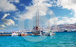 Icredible view of sailing yachts and boats and mountanious landscape of greece island