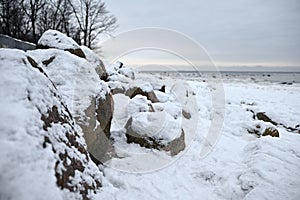 Icy beach witch rocks