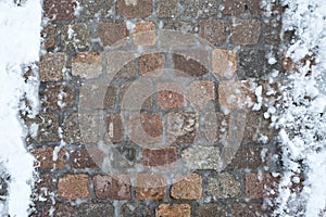 Icy cobblestone pavement