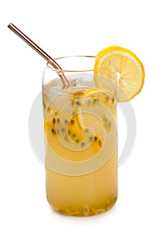 Icy cold drink with lemons and passion fruit