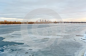 The icy Dnieper riverbed and distant Kiev