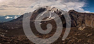 Icy glaciers on the slopes of Tolbachik Volcano near the crater