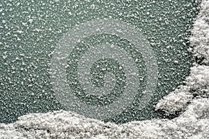 Icy sleet on window