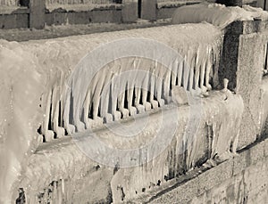 Icy stone wall in winter