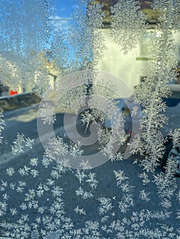 Icy Wonderland: Close-Up View of Frosty Car Window