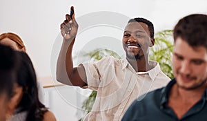 Id like to make a suggestion, if youd allow me please. a young businessman raising his hand during a conference.