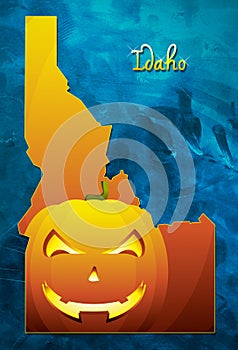 Idaho state map USA with halloween pumpkin face illustration