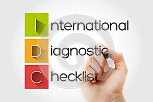 IDC - International Diagnostic Checklist acronym with marker, business concept background photo
