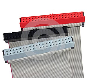 IDE connectors and ribbon cables for hard drive on PC computer, isolated, red, grey, black, macro closeup