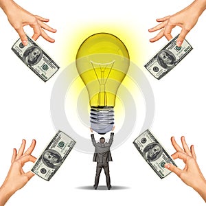 Idea concept with businessman holding light bulb