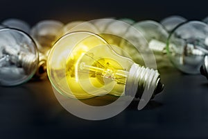 Idea concept with incandescent light bulbs photo