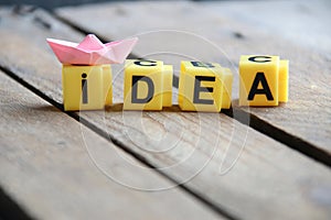 Idea and creativity concept. The inscription on yellow cubes.