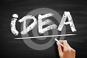 IDEA- Imagine, Dare, Expand, Achieve acronym, business concept on blackboard