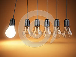 Idea o creativity concept. Light bulbs and perpetual motion.