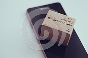 Stack boxes on laptop for Customer can buy from electronic internet.