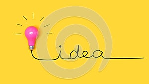 Idea text with a light bulb