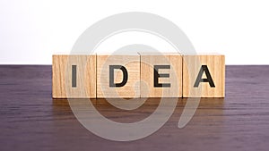 idea written in wooden cubes. conceptual word collected of wooden elements with the letters. stock image, brown