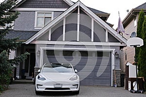 Ideal area. Suburban houses with a car garage in summer in North America. Neighborhoods of Vancouver, Canada