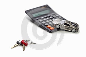 Ideas of Cars Loans and Credits. Composition of Scale Car and Keys against Calculator