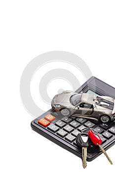 Ideas of Cars Loans and Credits. Composition of Scale Car and Keys against Calculator