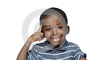 Ideas and Creativity for Africa: little black boy pointing his finger to his head thinking