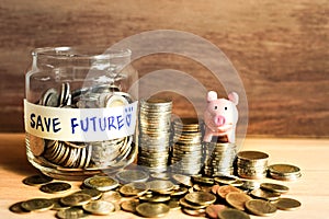 An ideas of saving money for the future with coins and piggy bank