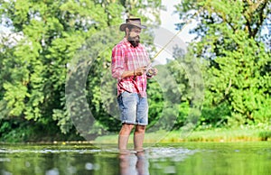 Ideas to inspire you. fisherman show fishing technique use rod. man catching fish. mature man fly fishing. experienced