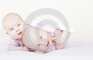 Identical baby twin sisters