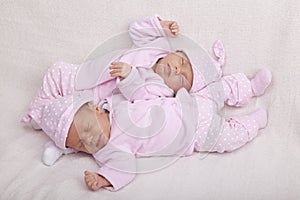 Identical twin sisters photo