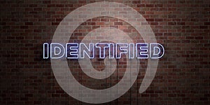 IDENTIFIED - fluorescent Neon tube Sign on brickwork - Front view - 3D rendered royalty free stock picture
