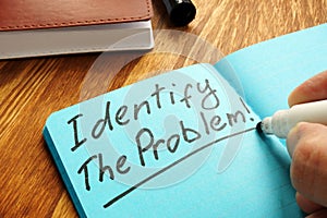 Identify the problem sign on the page photo