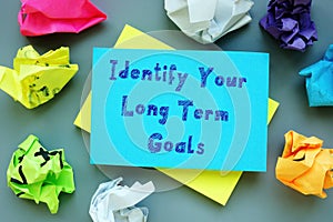 Identify Your Long Term Goals sign on the sheet